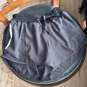 Black lululemon shorts, old style